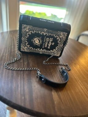 Fairy Tales Book-Style Crossbody Bag in Black and Silver
